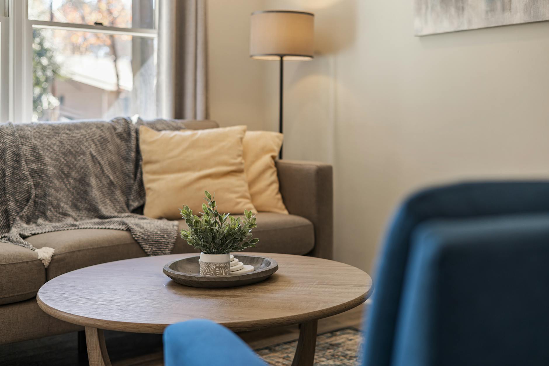 round coffee table couch and armchair